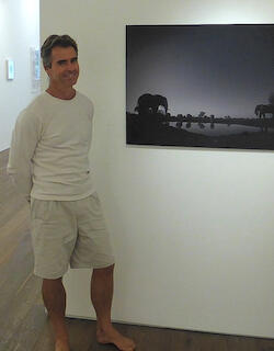 Image named /data06/artfirst/public_html/site/assets/files/16299/wolhuter-with-bull-elephants-and-rhino.jpg